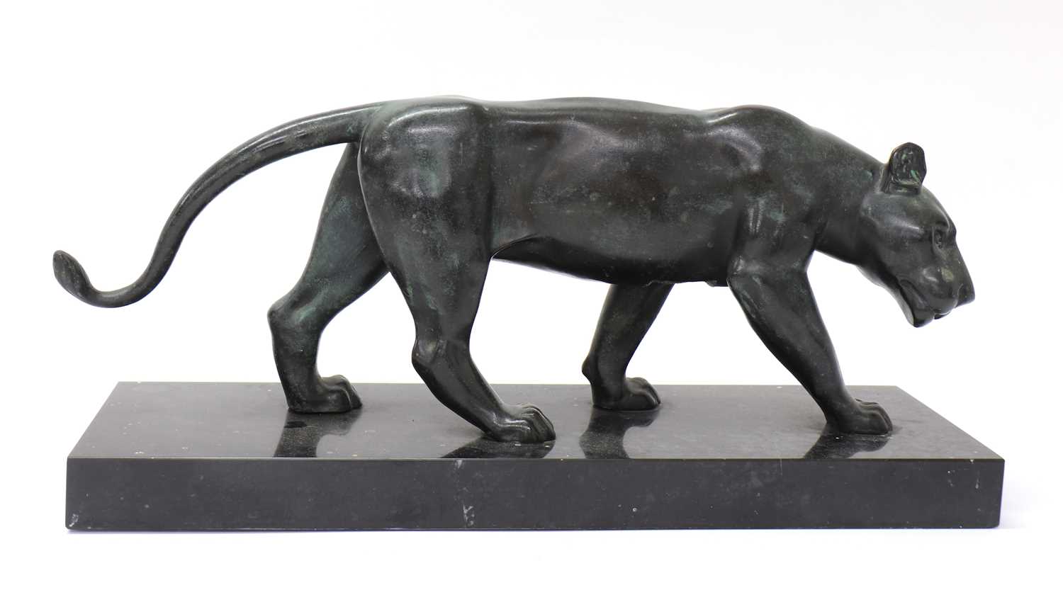 Lot 215 - A bronze of a prowling lioness