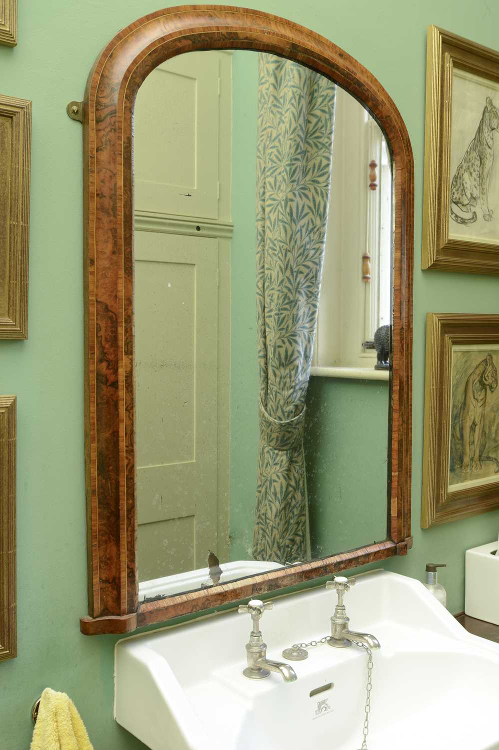 Lot 440 - A Victorian walnut wall mirror