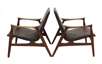 Lot 287 - A pair of Danish teak armchairs