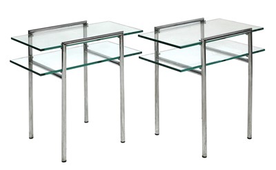 Lot 328 - A pair of chrome and glass side tables