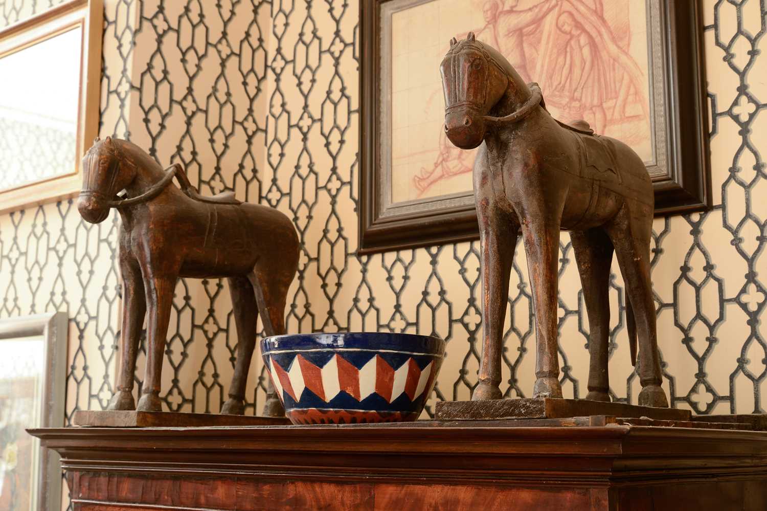 Lot 268 - A pair of carved wooden horses