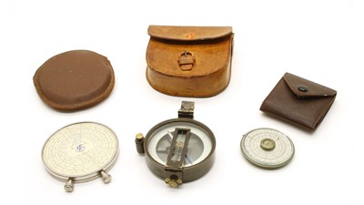 Lot 217 - A Fowler's 'Twelve-Ten' patent calculator, a pocket calculator & compass