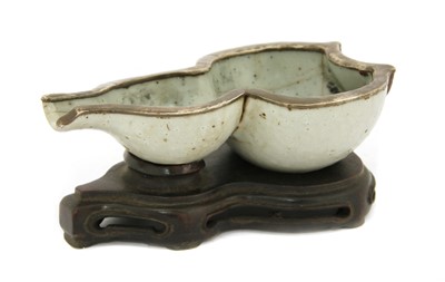 Lot 425 - A Chinese stoneware half double gourd