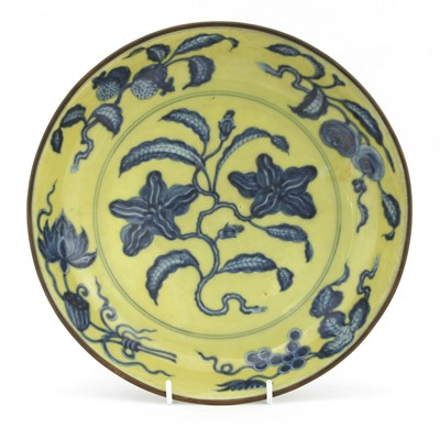 Lot 97 - A Chinese yellow-ground blue and white dish