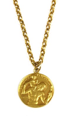 Lot 137 - A 9ct gold St. Christopher medallion, by Paul Vincze