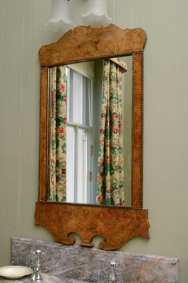 Lot 370 - A George II-style walnut fret-framed mirror