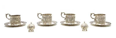 Lot 41 - A set of four Indian silver cup holders and saucers