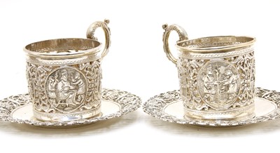 Lot 41 - A set of four Indian silver cup holders and saucers
