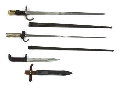 Lot 803 - Two Martini Henry rifle bayonets with scabbards