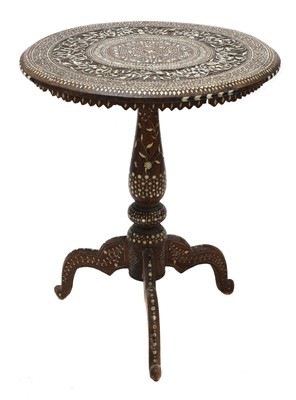 Lot 883 - An Indian tripod table