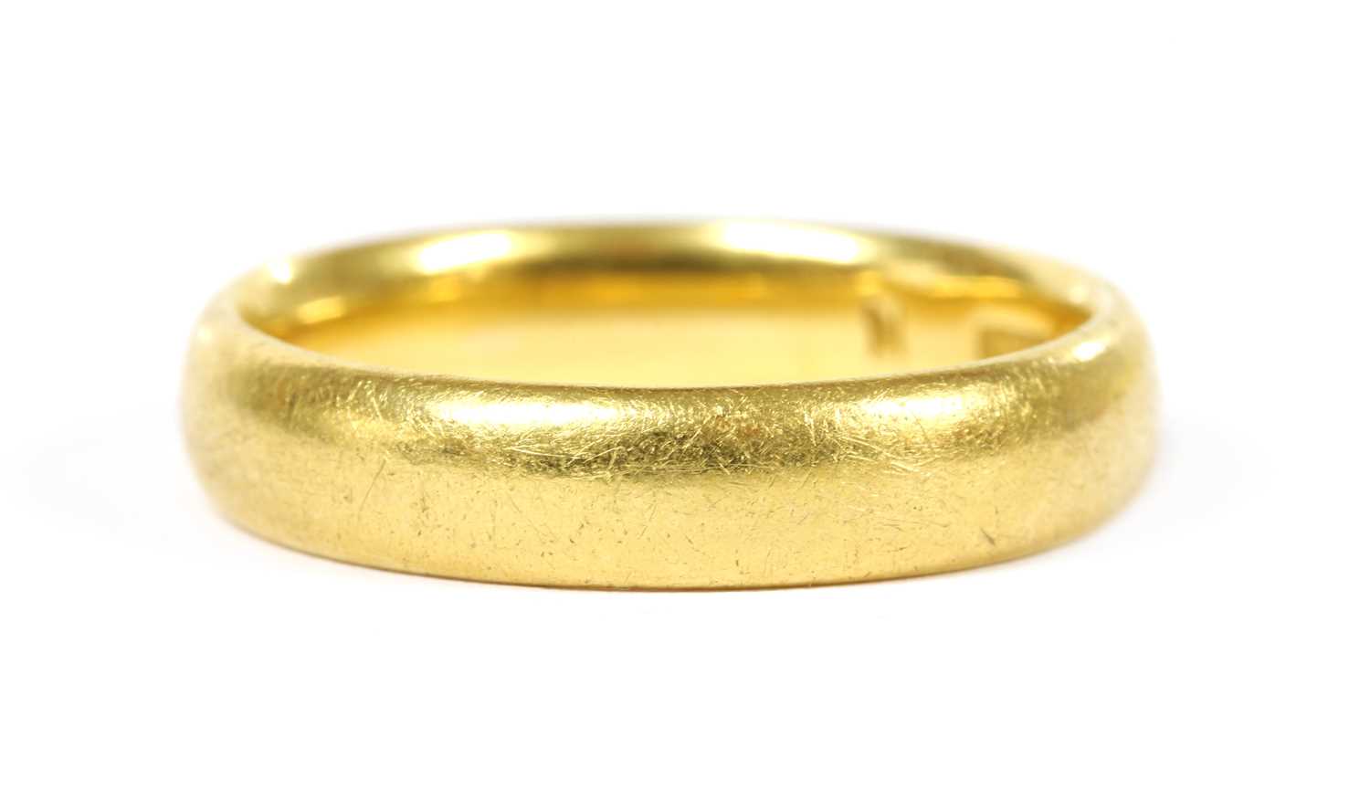 Lot 88 - A 22ct gold court section wedding ring
