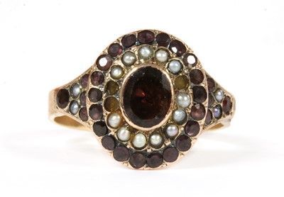 Lot 7 - A Victorian gold garnet and split pearl cluster