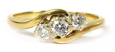 Lot 171 - A gold three stone diamond ring