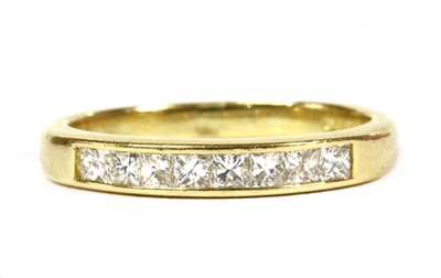 Lot 178 - An 18ct gold diamond half eternity ring