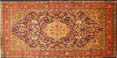 Lot 365 - A Kashan rug