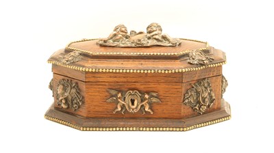 Lot 218 - A continental oak jewellery casket