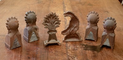 Lot 230 - A set of four cast iron figural doorstops