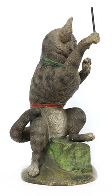 Lot 226 - A French painted terracotta figure of a cat conductor
