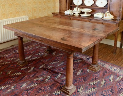 Lot 215 - A walnut and fruitwood table
