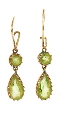 Lot 198 - A pair of Edwardian gold peridot drop earrings