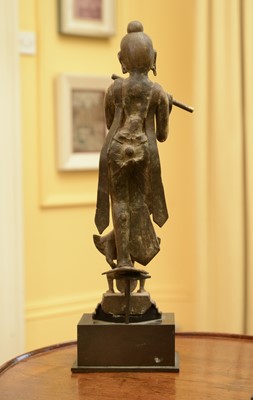 Lot 114 - An Indian gilt-bronze figure