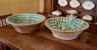 Lot 234 - A pair of very large partially-glazed earthenware bowls