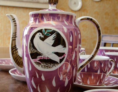Lot 249 - A lustre glazed 'Dove and Flood' design part tea and coffee set
