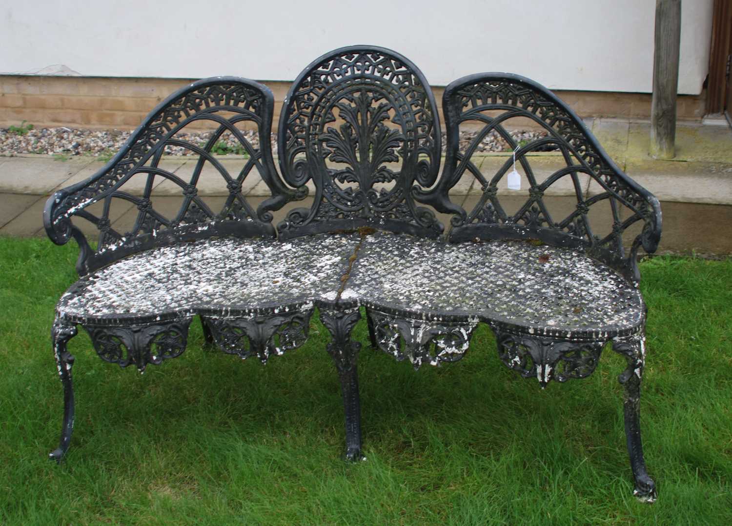 Lot 388 - A modern green painted metal garden bench