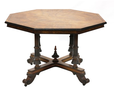 Lot 494 - A late Victorian walnut and ebonised octagonal centre table
