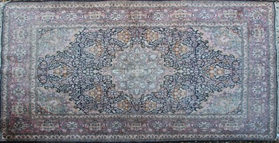 Lot 408 - A Persian silky carpet