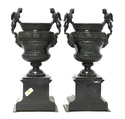 Lot 131 - A pair of French bronze and marble garniture urns