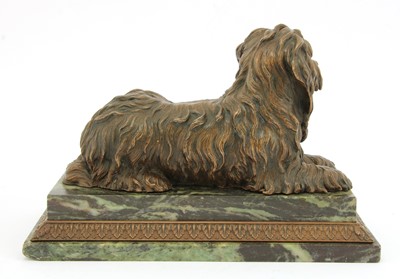 Lot 343 - A bronze figure of a recumbent terrier