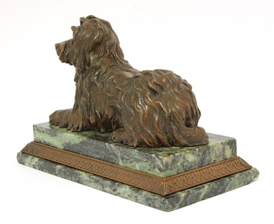 Lot 343 - A bronze figure of a recumbent terrier