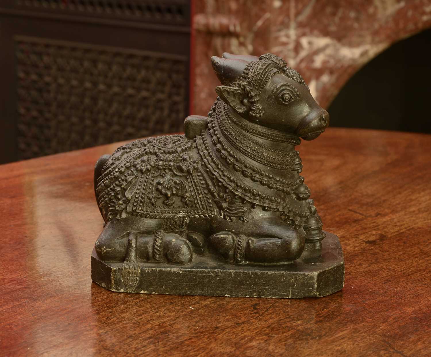 Lot 127 - An Indian carved stone figure of Nandi