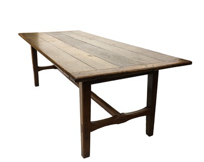 Lot 473 - An oak plank top refectory table