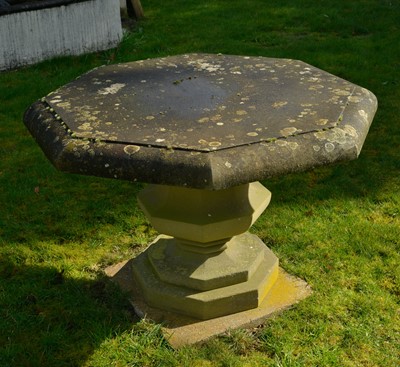 Lot 460 - An octagonal reconstituted stone garden table
