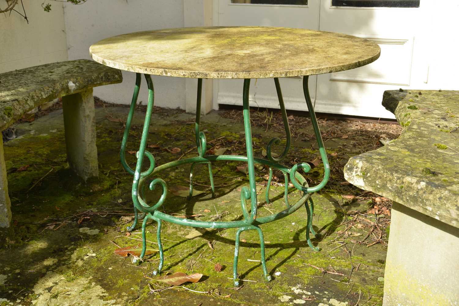 Lot 454 A marbletopped wrought iron garden table,