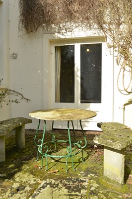 Lot 454 - A marble-topped wrought iron garden table