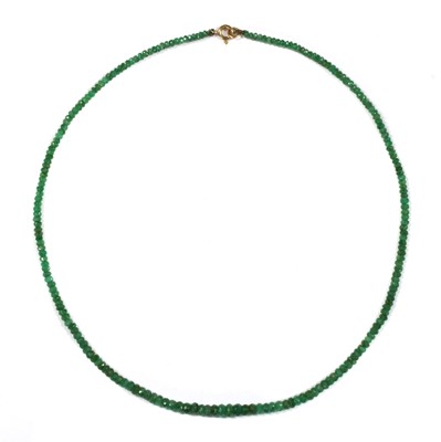 Lot 147 - A single row graduated faceted emerald bead necklace