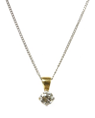 Lot 257 - A gold single stone diamond pendant