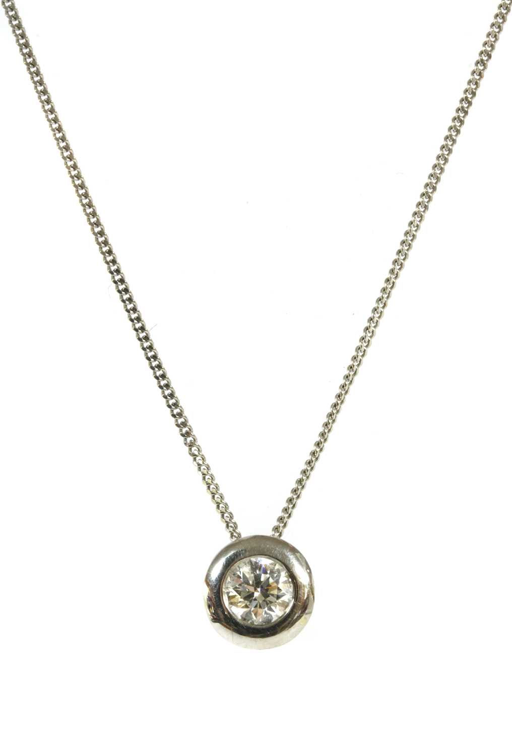 Lot 118 - An 18ct white gold single stone diamond pendant