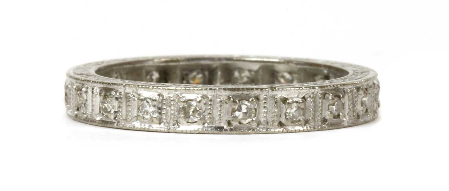Lot 60 - A white gold diamond full eternity ring