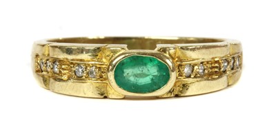 Lot 218 - A 9ct gold emerald and diamond ring