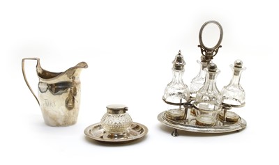 Lot 48 - Three silver items comprising a Georgian helmet shaped cream jug
