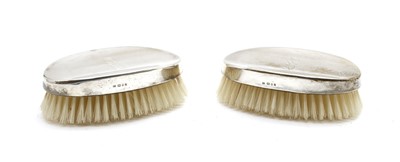 Lot 22 - A pair of silver mounted brushes