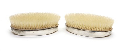 Lot 22 - A pair of silver mounted brushes