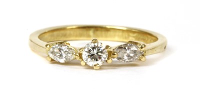 Lot 169 - An 18ct gold three stone diamond ring