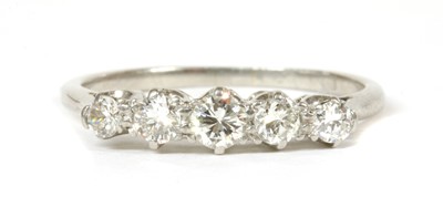 Lot 226 - A platinum five stone diamond ring