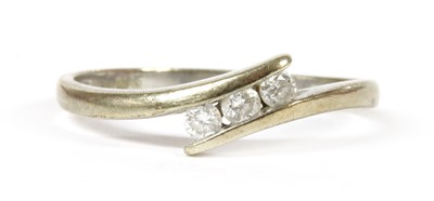 Lot 227 - A 9ct white gold three stone diamond ring