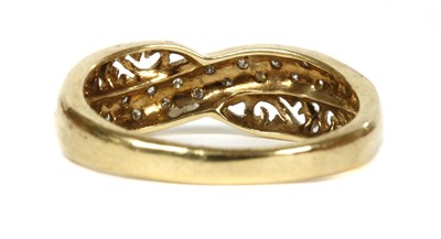 Lot 187 - A 9ct gold diamond crossover ring